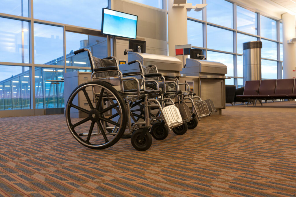 Accessibility Torurism, wheelchair in airport hall